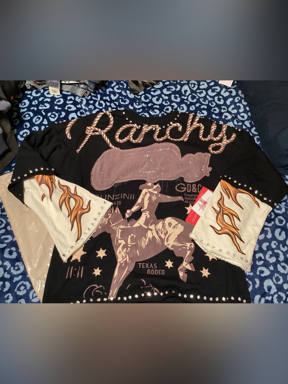 Black Pullover with Beige Rodeo Graphic and Flame-Sleeve Accents